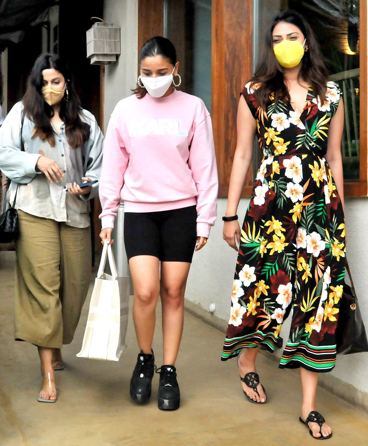 Alia Bhatt stepped out to catch up with friends for brunch at Shilpa Shetty's restaurant in Worli, Mumbai. She was snapped with her sister, Shaheen Bhatt and 'Wedding Pullav' actress Anushka Ranjan, as they exited the venue.