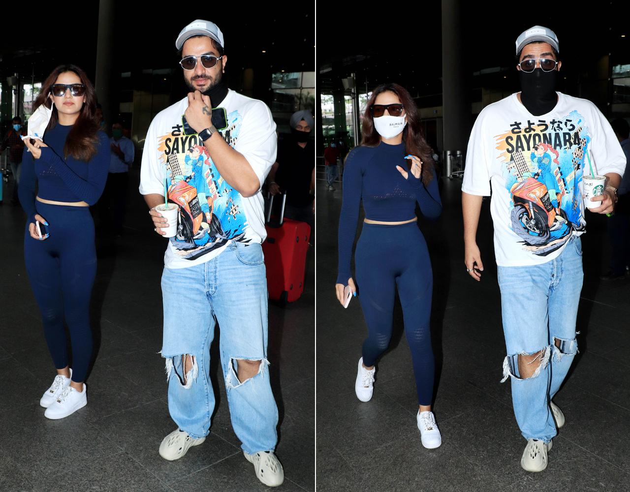 Jasmin Bhasin looked chic as she opted for an all-blue attire with a crop top and workout pants, whereas Aly looked smart in ripped jeans, a white t-shirt with graphic print, and a cap.