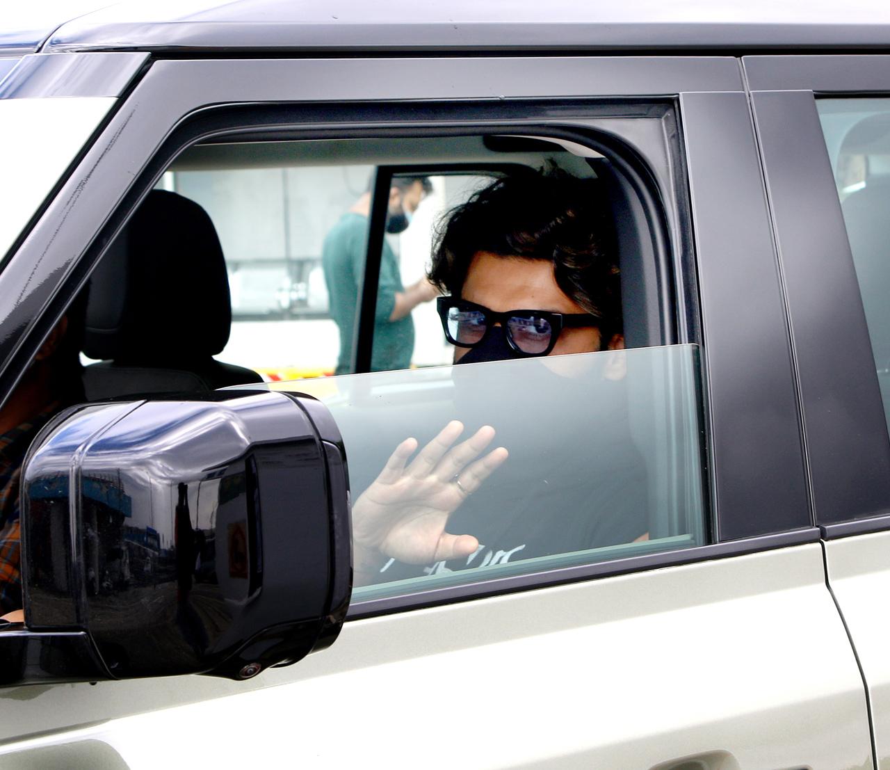 Arjun Kapoor opted for a casual look as he stepped out in the city on Tuesday. Despite being inside his car, the actor made sure to keep his mask up till his nose!