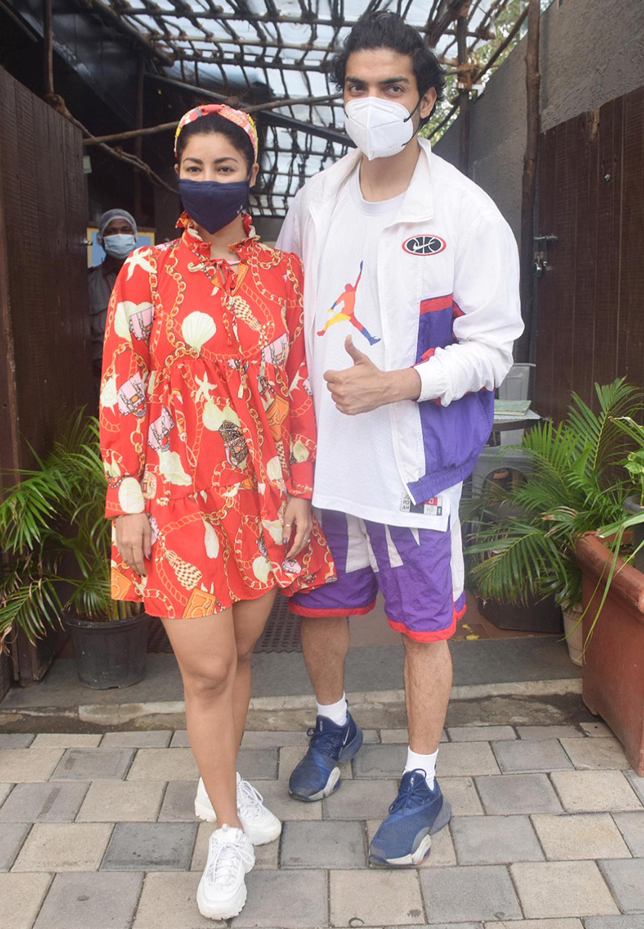Gurmeet Choudhary and Debina Bonnerjee were snapped with their pet dog, outside a coffee shop in Juhu, Mumbai. Debina looked pretty in an orange dress, while Gurmeet looked smart in casuals,. Gurmeet Choudhary and Debina Bonnerjee were snapped with their pet dog, outside a coffee shop in Juhu, Mumbai. Debina looked pretty in an orange dress, while Gurmeet looked smart in casuals,.
