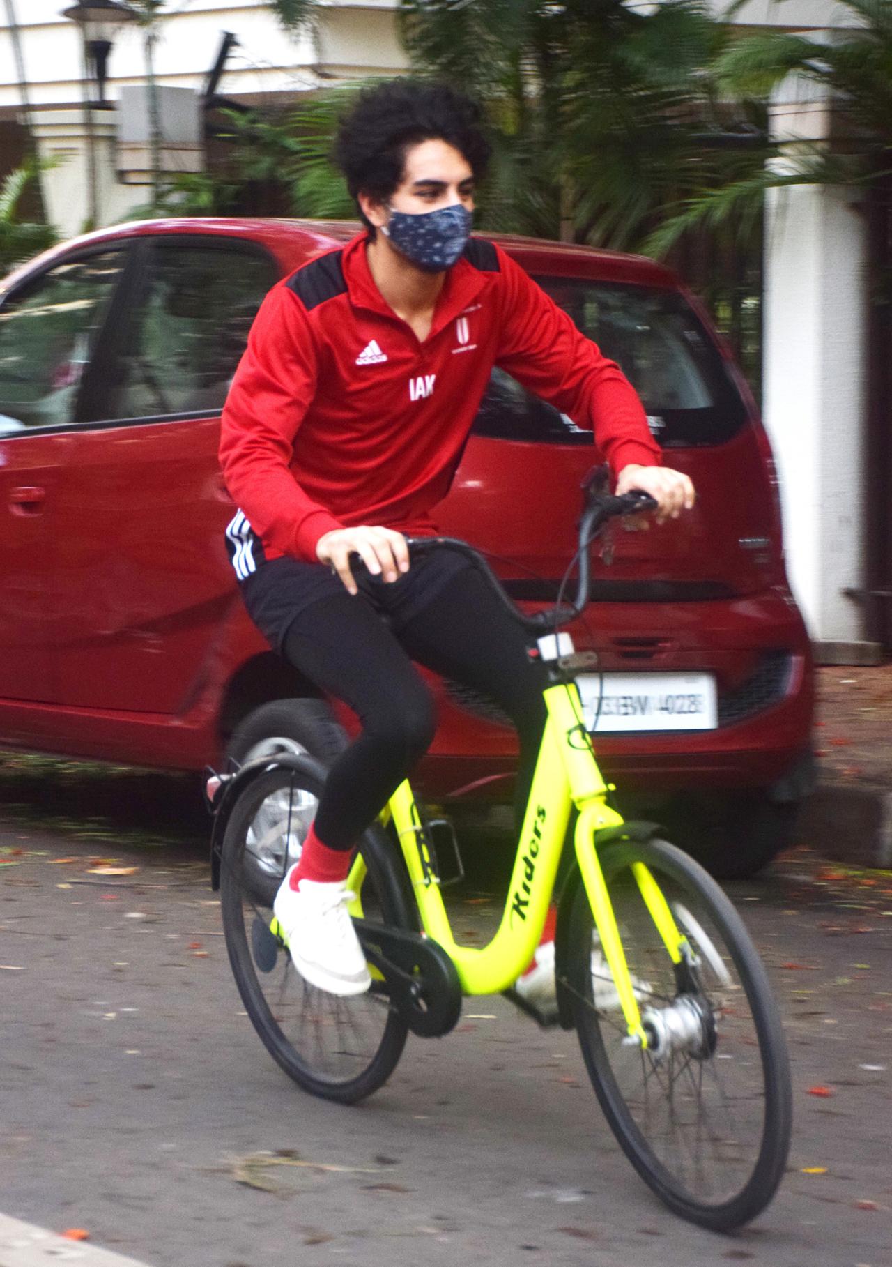 Ibrahim Ali Khan was clicked cycling on the streets of Juhu, Mumbai. The star kid opted for a red jersey, paired with cycling shorts and leggings. We loved Ibrahim`s bicycle. Ibrahim Ali Khan was clicked cycling on the streets of Juhu, Mumbai. The star kid opted for a red jersey, paired with cycling shorts and leggings. We loved Ibrahim`s bicycle.