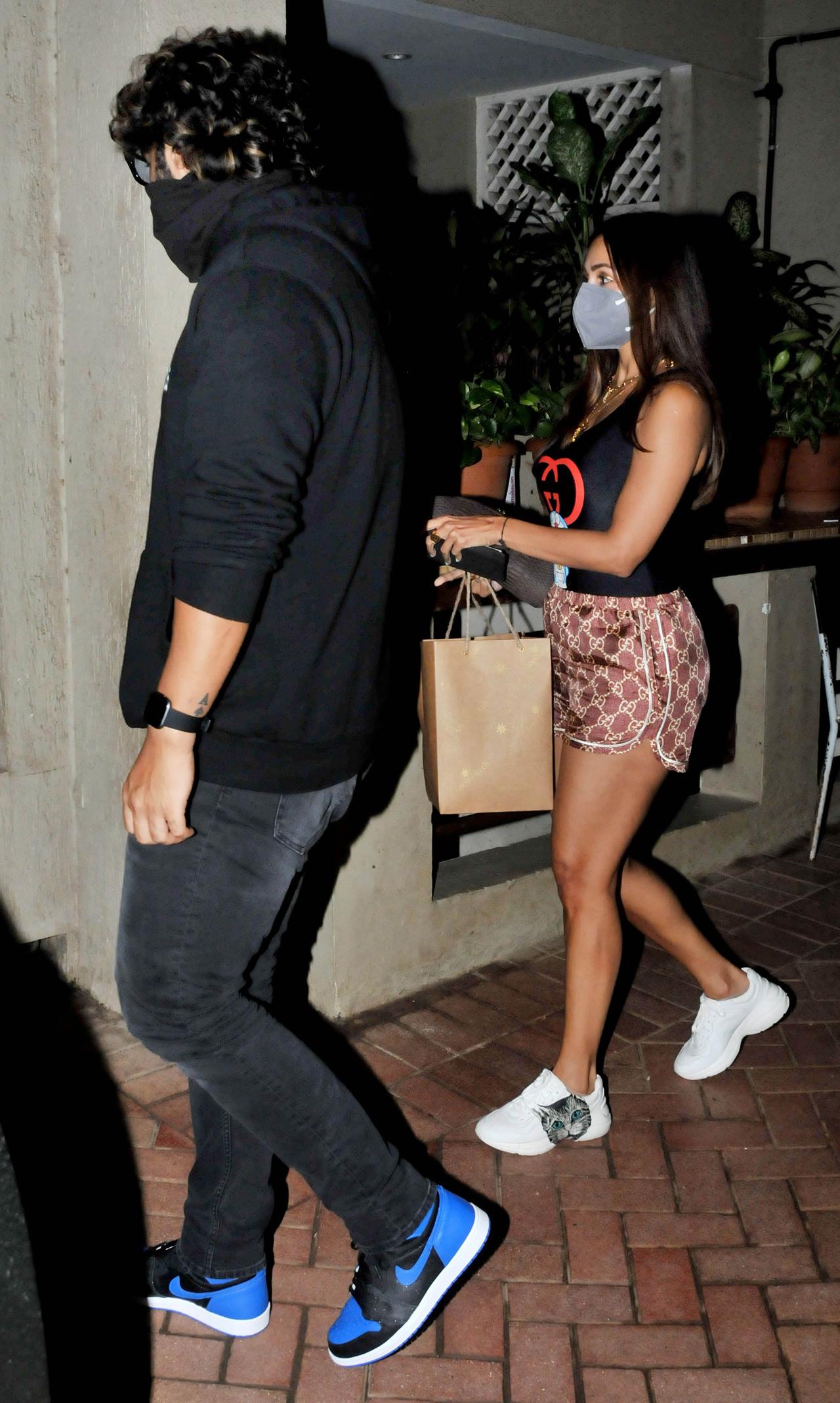 For Kareena Kapoor's party, Malaika Arora looked stylish as she opted for a Gucci top, paired with hot shorts and white sneakers. Arjun Kapoor was dressed in his casual best - sweatshirt and jeans.