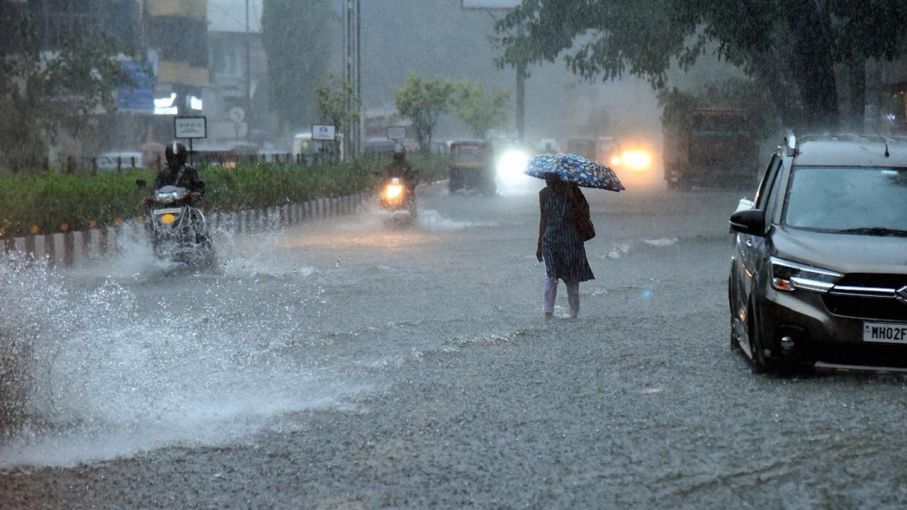 Mumbai rains: Roads flooded, public transport hit as heavy showers pound city