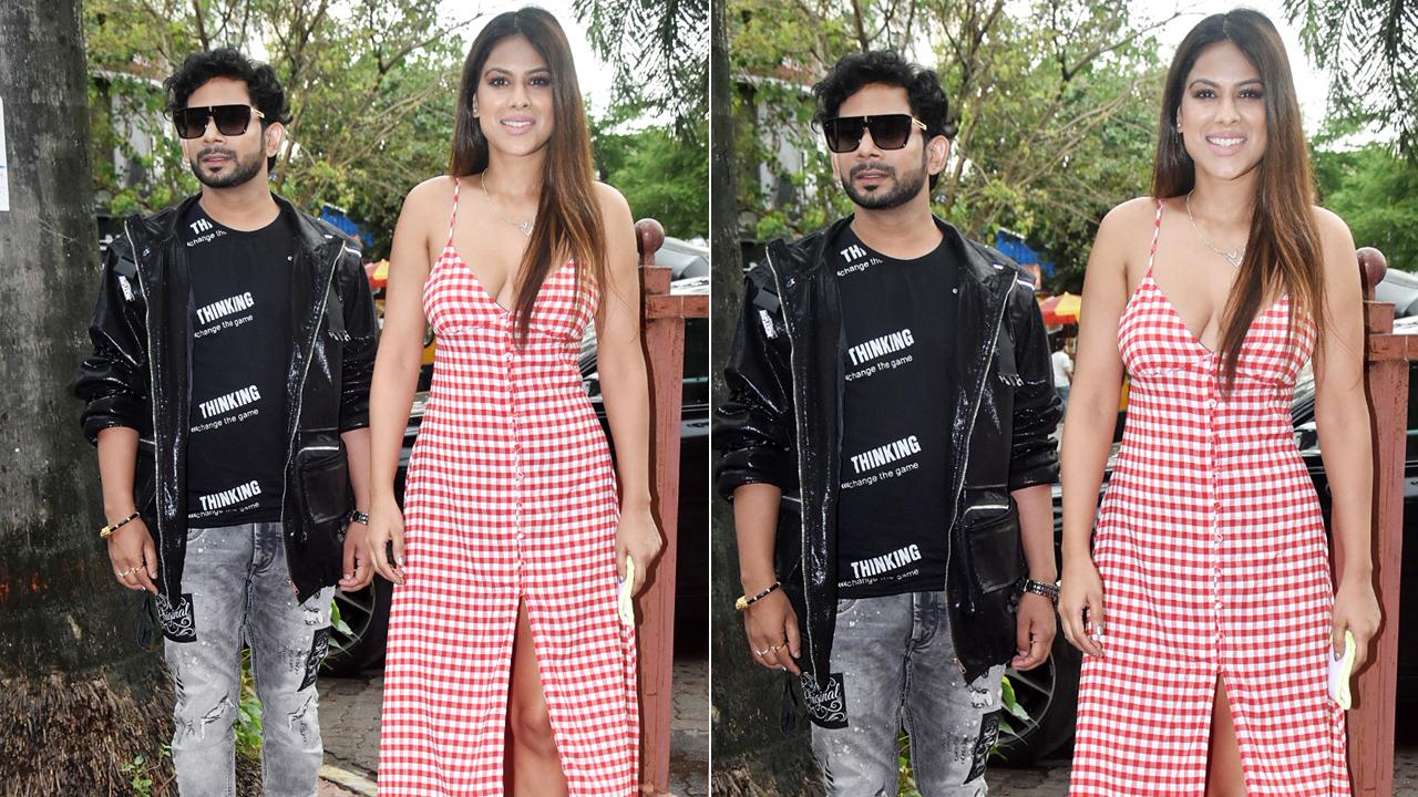Nia Sharma was clicked with her `Ankhiyaan Da Ghar` co-actor Kamal Kumar in Andheri. The song has become one of the most talked-about songs in recent times, all thanks to Kamal`s proposal prank that fans got excited about. `Aankiyan Da Ghar` is due for release this month. Nia Sharma was clicked with her `Ankhiyaan Da Ghar` co-actor Kamal Kumar in Andheri. The song has become one of the most talked-about songs in recent times, all thanks to Kamal`s proposal prank that fans got excited about. `Aankiyan Da Ghar` is due for release this month.