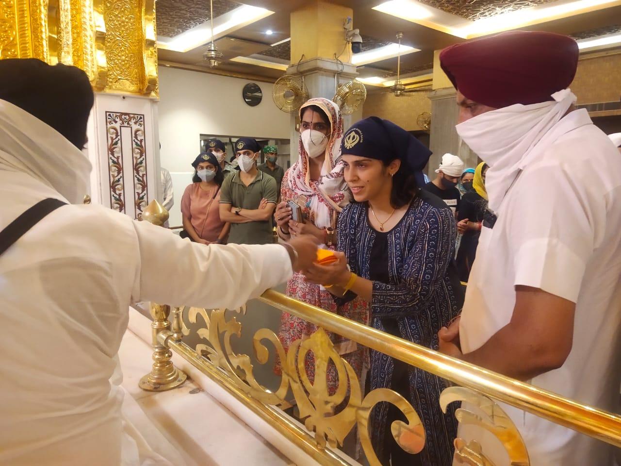 In pic: Saina Nehwal receives blessings at the Gurudwara Bangla Sahib.