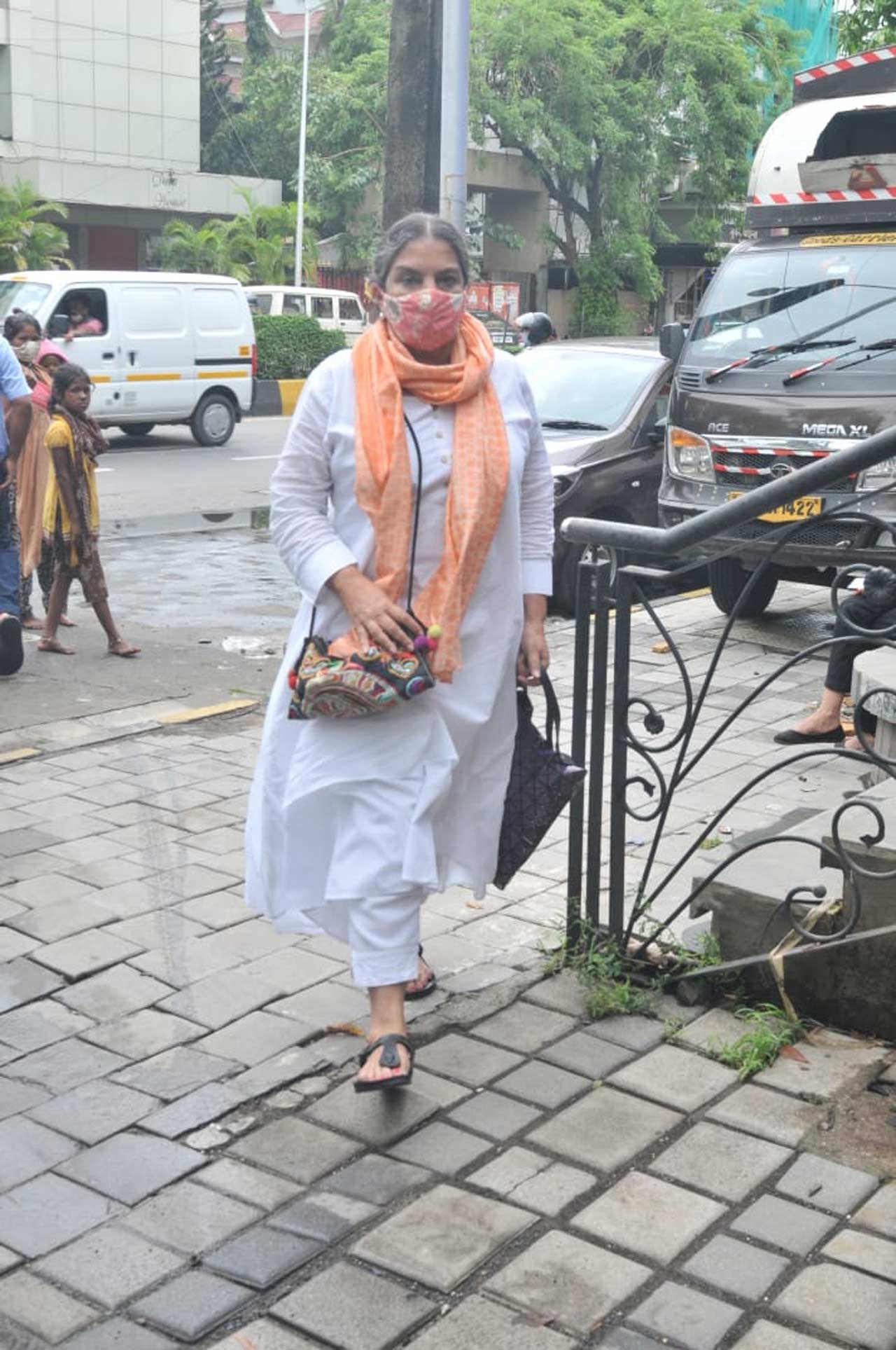 Shabana Azmi was snapped near her vicinity, and it seems like the actress stepped out to buy her daily essentials. Shabana Azmi was snapped near her vicinity, and it seems like the actress stepped out to buy her daily essentials.