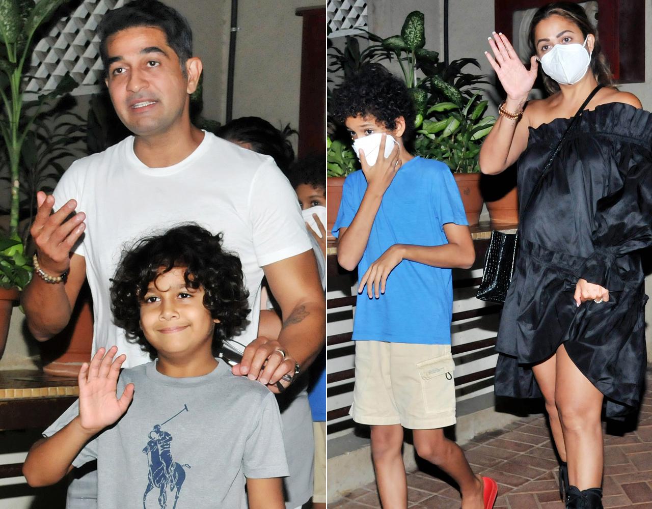Amrita Arora Ladak attended Kareena Kapoor Khan's house party along with her husband, Shakeel Ladak and kids - Rayaan and Azaan Ladak. The family was clicked while leaving the party and heading home. They were all smiles and even greeted the paparazzi, before making their way to the car.