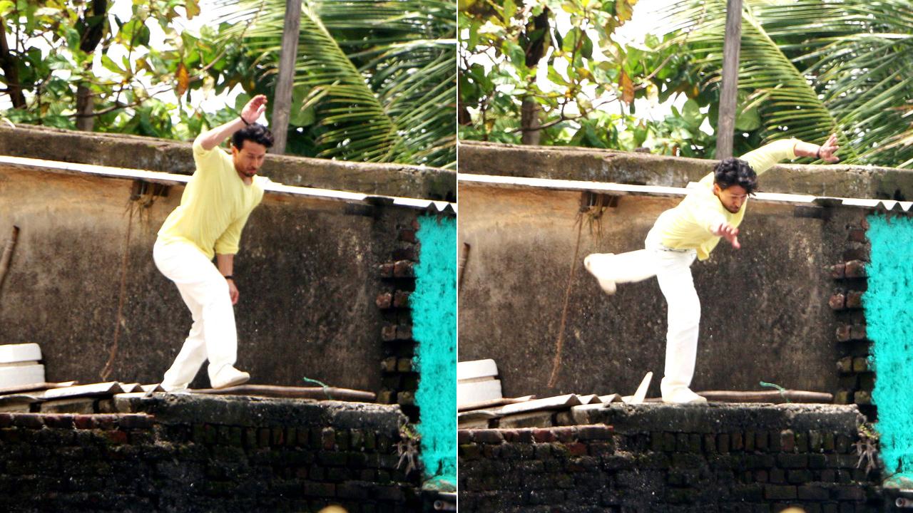Tiger Shroff was clicked shooting for a stunt scene in Worli, Mumbai. The actor, apparently, was shooting for a promo for his upcoming project. Dressed in a lime yellow t-shirt and white pants, Tiger looked confident while doing his job. Don't you think so?