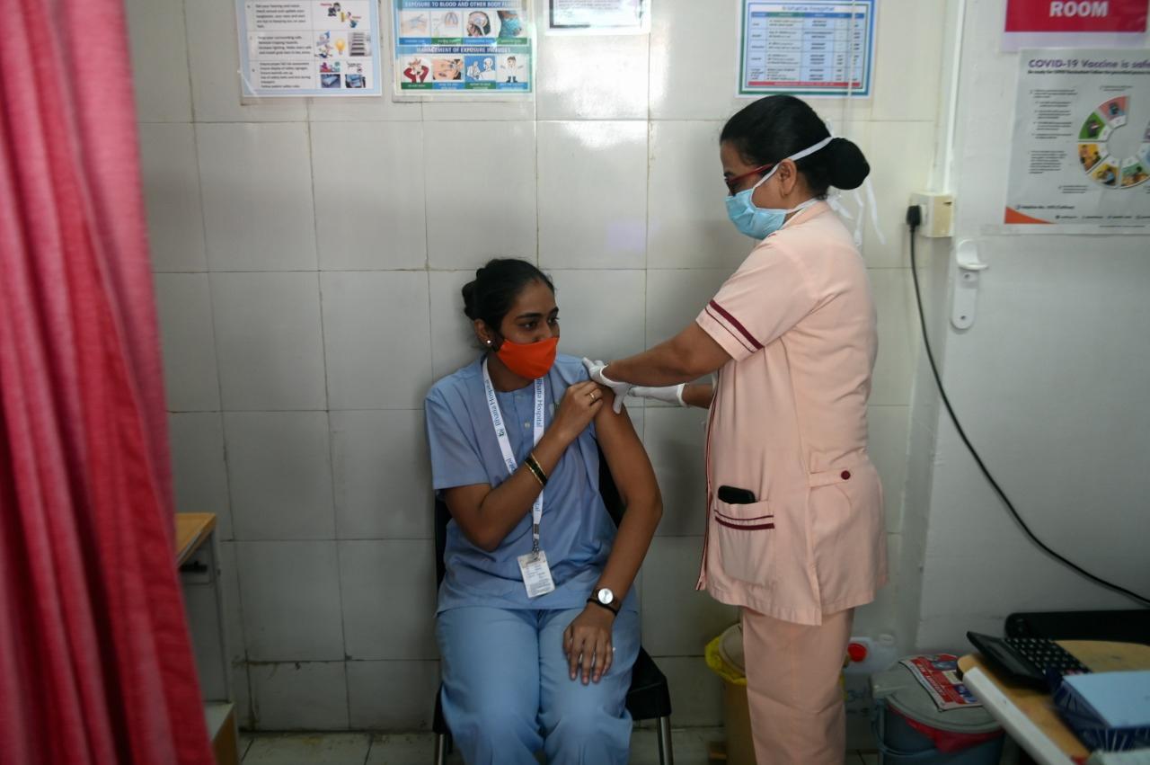 In picture: A hospital staff takes COVID-19 vaccine at Bhatia Hospital in Mumbai. Photo: Bipin Kokate