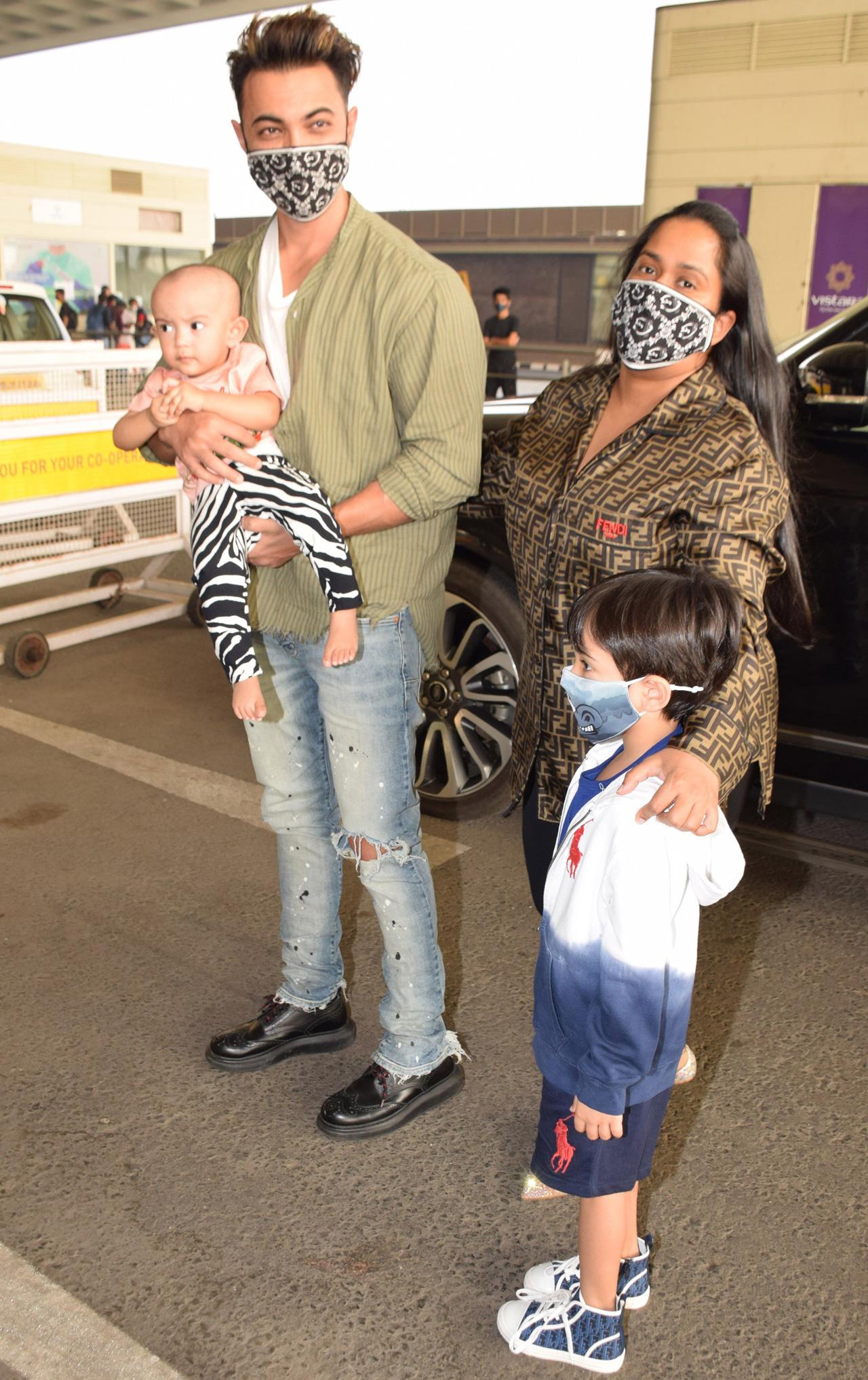 Aayush Sharma with Arpita Khan Sharma and kids were spotted at Mumbai airport. Looks like Aayush is headed for a much-deserved break family.