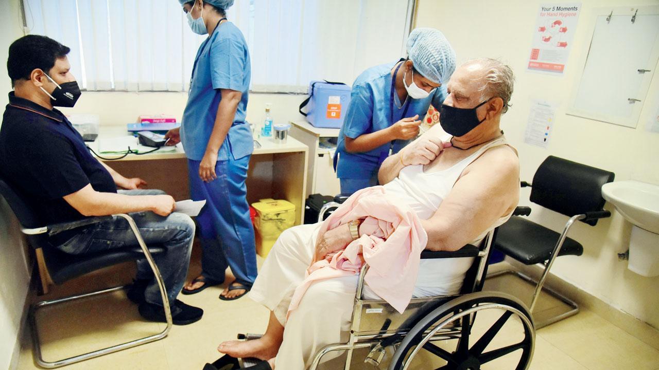 BMC's vaccination drive: People wait for hours to get their jabs at SevenHills Hospital in Andheri