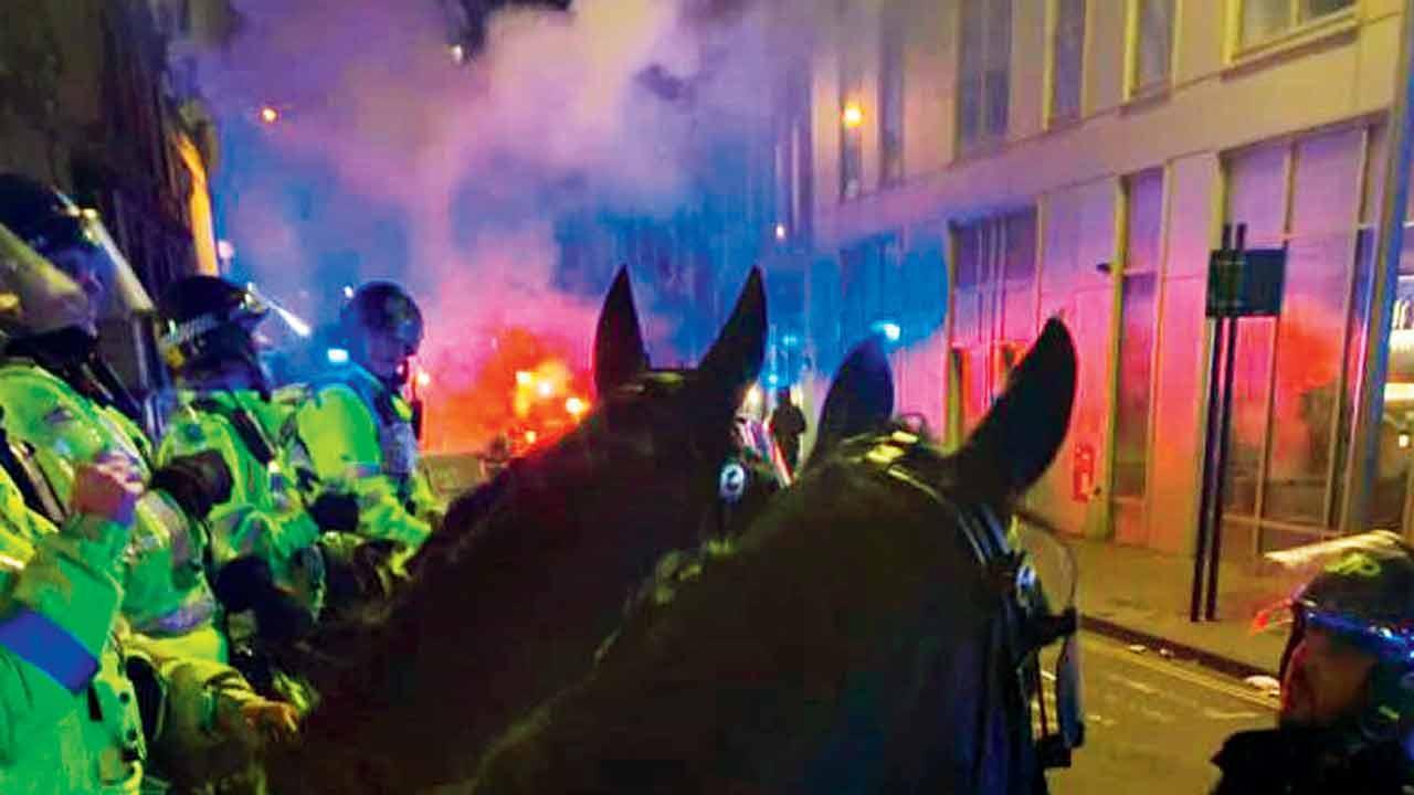 Cops attacked as protest turns violent in Bristol