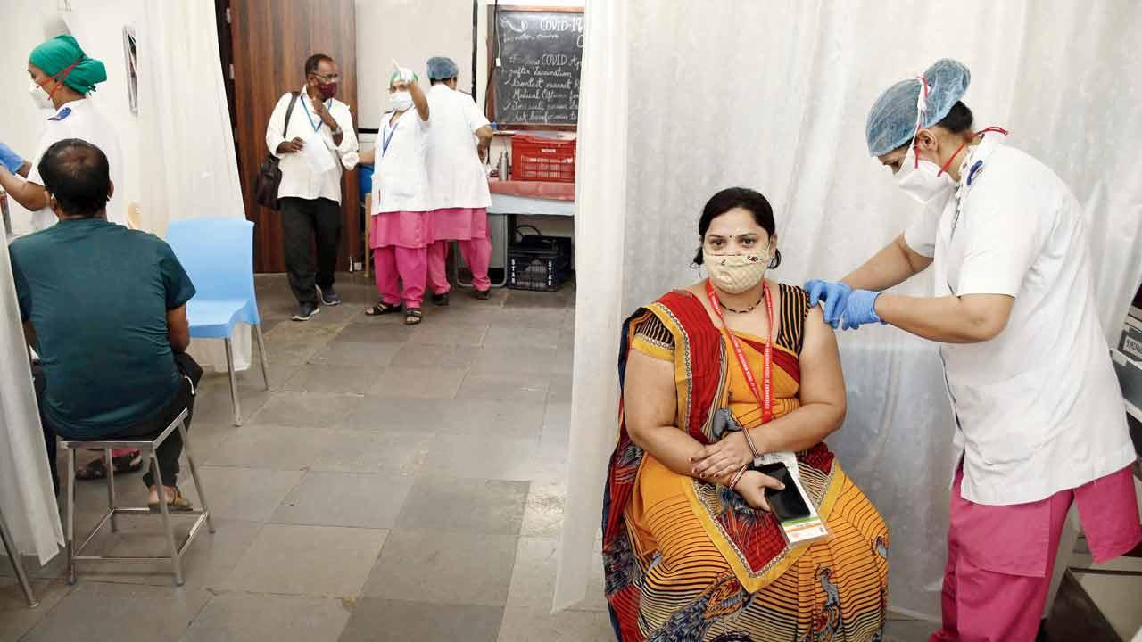 Vaccinations such as at Nair Hospital seen here on Wednesday are on in full swing and the union government has also allowed those over 45 years to be inoculated from April. Pic/Ashish Raje