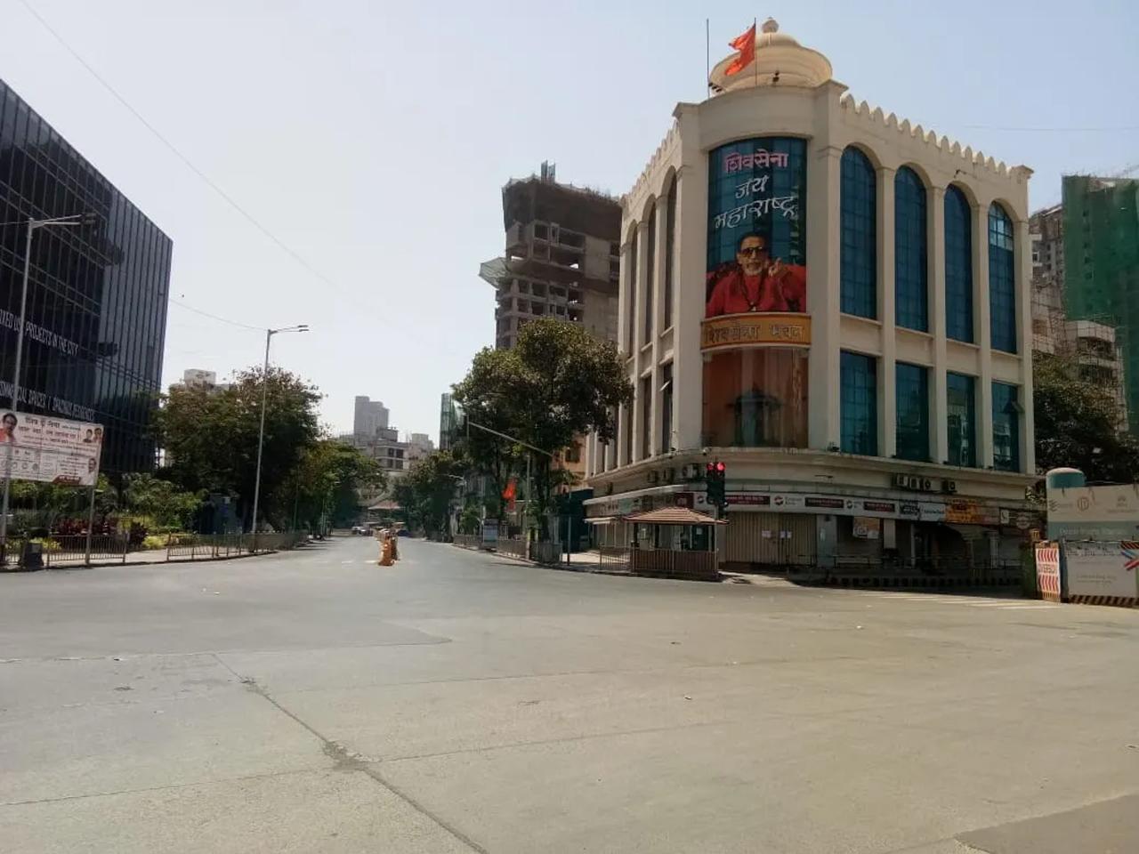 The road opposite Sena Bhavan - the Shiv Sena headquarters in Dadar wears a deserted look after Prime Minister Narendra Modi announced 'Janata Curfew' on March 22, 2020 following the outbreak of the novel coronavirus.