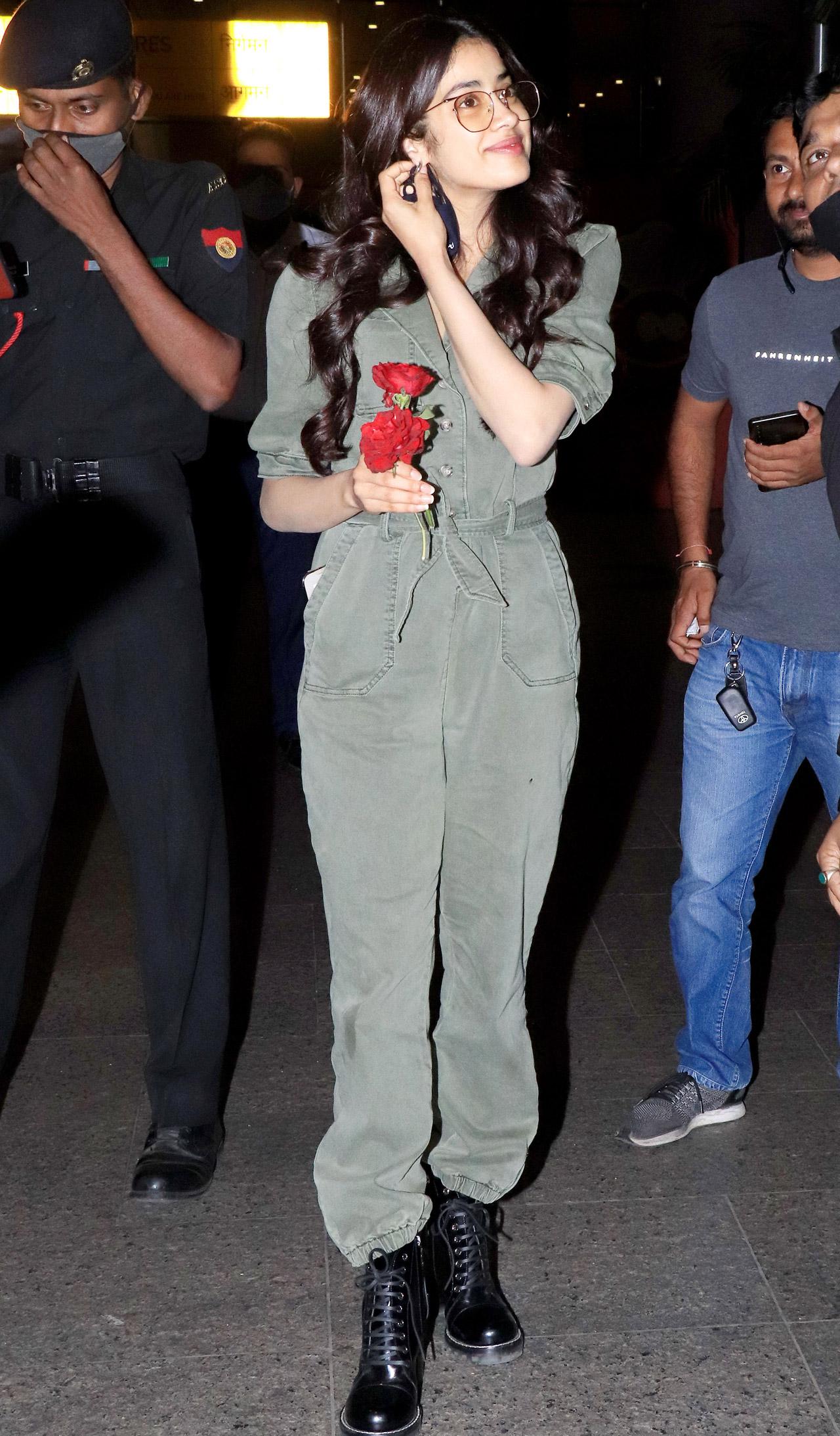 Janhvi Kapoor was all smile as she arrived at the Mumbai airport. The actress kept it chic in a jumpsuit as posed for the photographers. Janhvi, who turned a year older on March 6, had a cake cutting with the media as she arrived at the airport. The actress is currently busy promoting her upcoming horror-comedy Roohi, which also stars Rajkummar Rao and Varun Sharma.