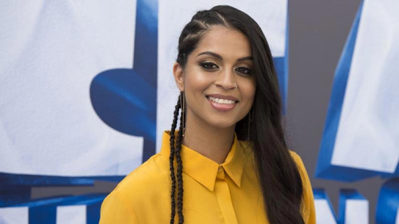 Lilly Singh wears 'I Stand With Farmers' mask at 2021 Grammys