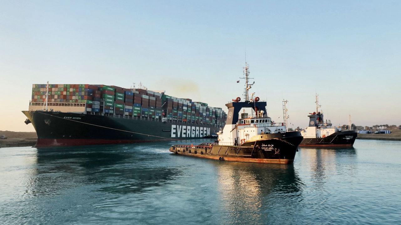 Container ship blocking Suez refloated, but still stuck at canal’s edge