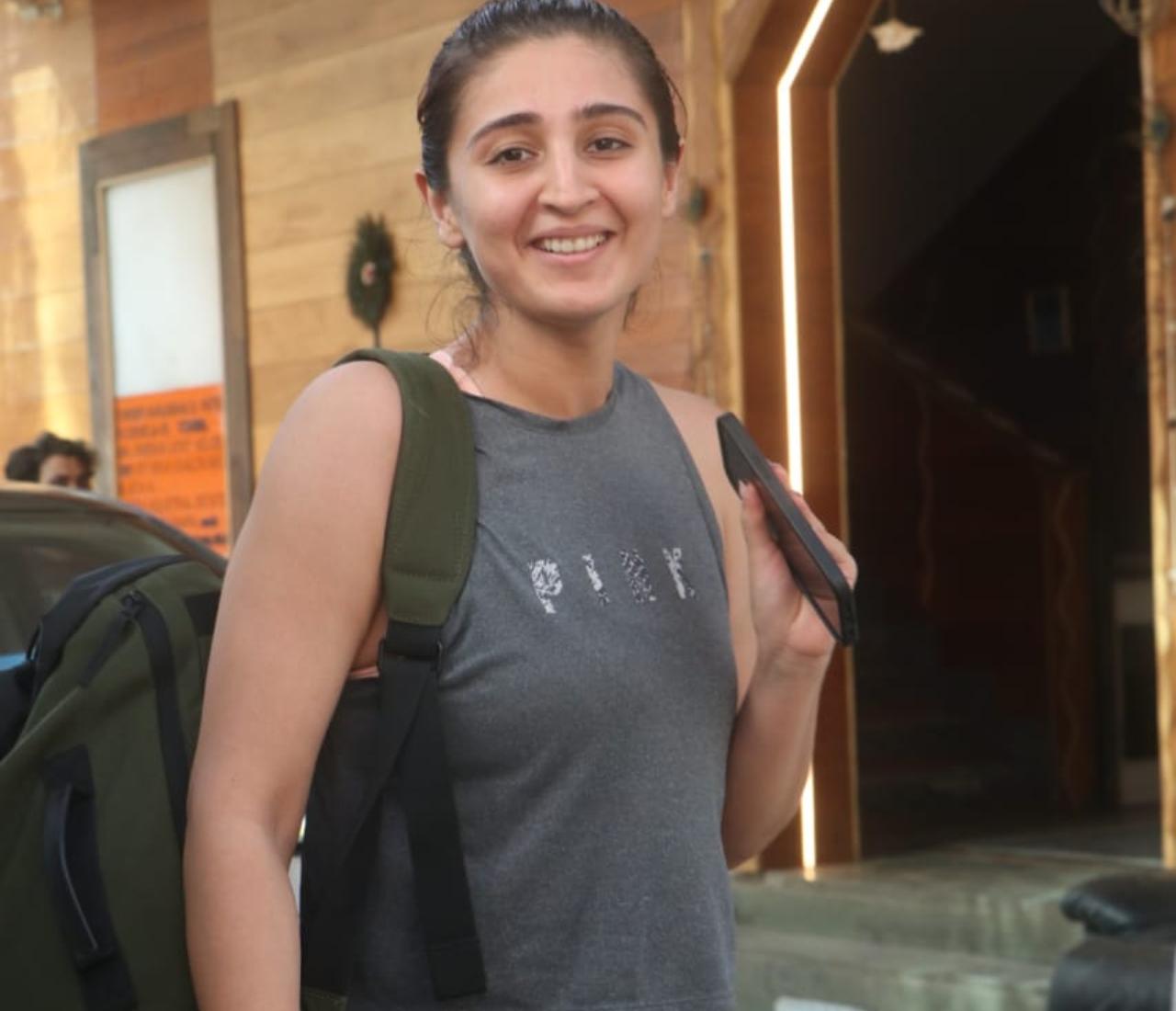 Singer Dhvani Bhanushali was also clicked in Juhu. She opted for grey crop top and trousers for the outing.