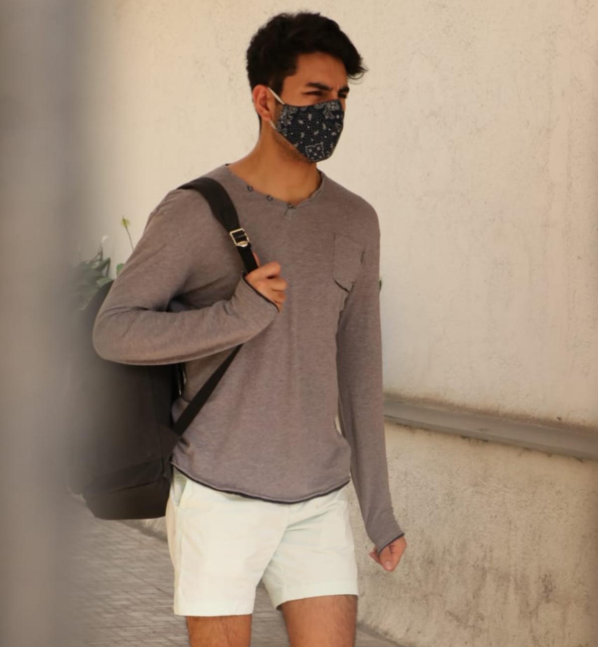 Ibrahim Ali Khan showed off his muscles in his grey t-shirt and white shorts as he was clicked in Bandra.