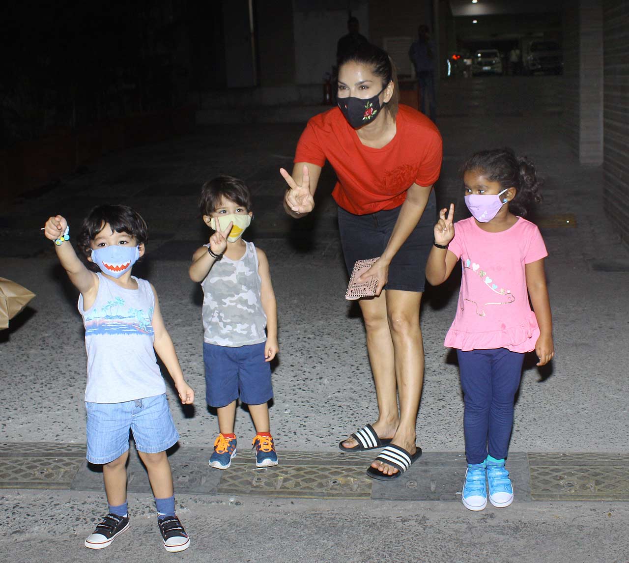Sunny Leone was clicked with her kids - Nisha Kaur Weber, Asher Singh Weber and Noah Singh Weber in Juhu, Mumbai. The family posed for the paparazzi when papped in the city.