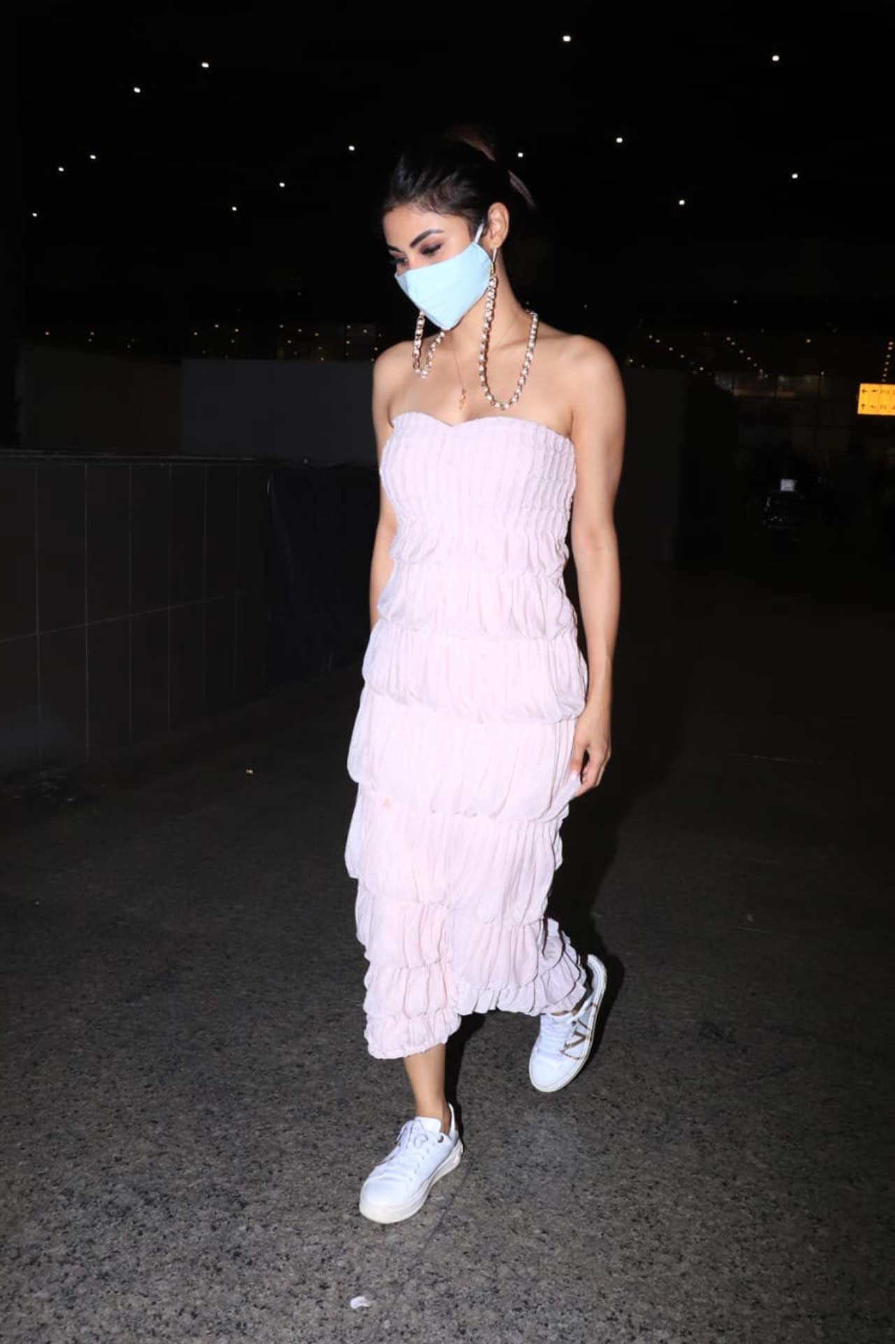 Mouni Roy stunned in a ruffled dress as she opted for a pretty strap outfit for her airport look! The actress, who made her digital debut with London Confidential, is all set to play a pivotal role in Ayan Mukerji's fantasy drama, Brahmastra, starring Ranbir Kapoor and Alia Bhatt. All pictures/Yogen Shah