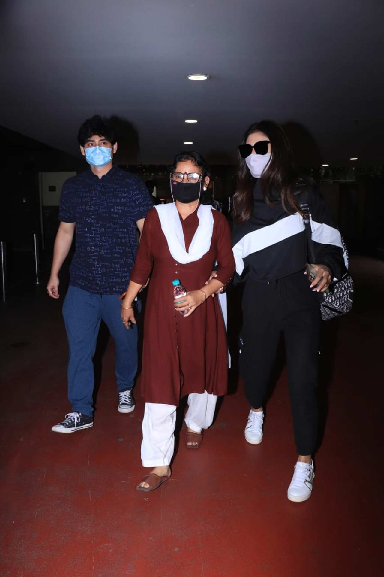Mouni Roy was also spotted at the Mumbai airport with her mother and brother. The actress was in Banglore, along with her family, spending some quality time together.