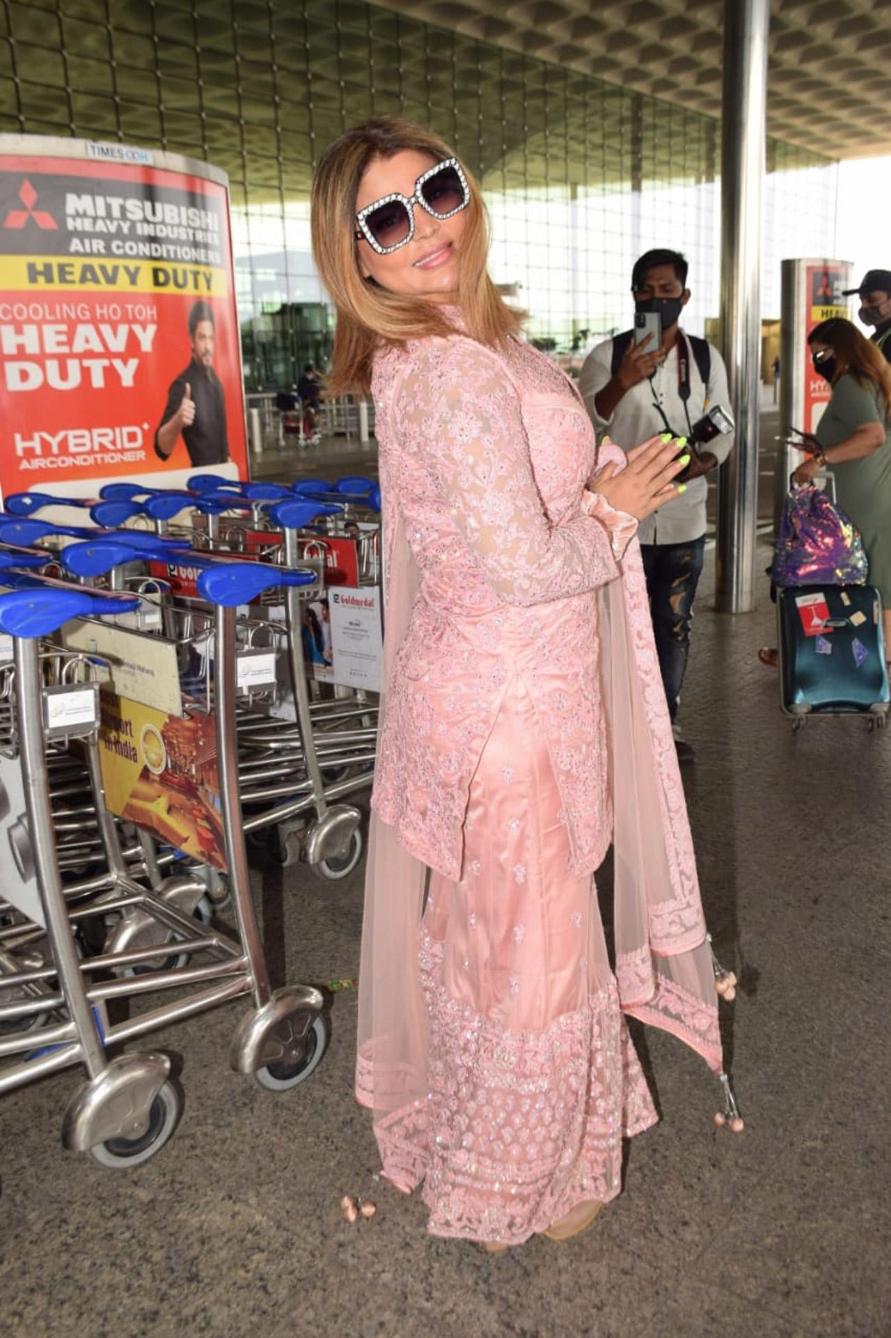 Rakhi Sawant happily posed for the paparazzi, before heading to the entrance gate of the airport. The actress, apparently, jetted off to Goa for a vacation.