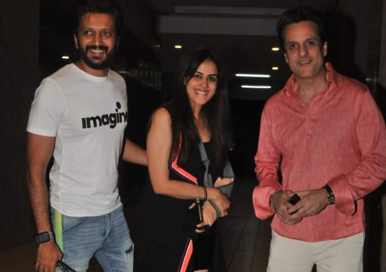 Riteish Deshmukh clicked with his wife Genelia Deshmukh at the residence of producer Ramesh Taurani in Bandra, Mumbai. Genelia looked classy in her black leather dress and jacket while the Housefull 4 star looked dapper in his white t-shirt and denims. (All pictures: Yogen Shah).