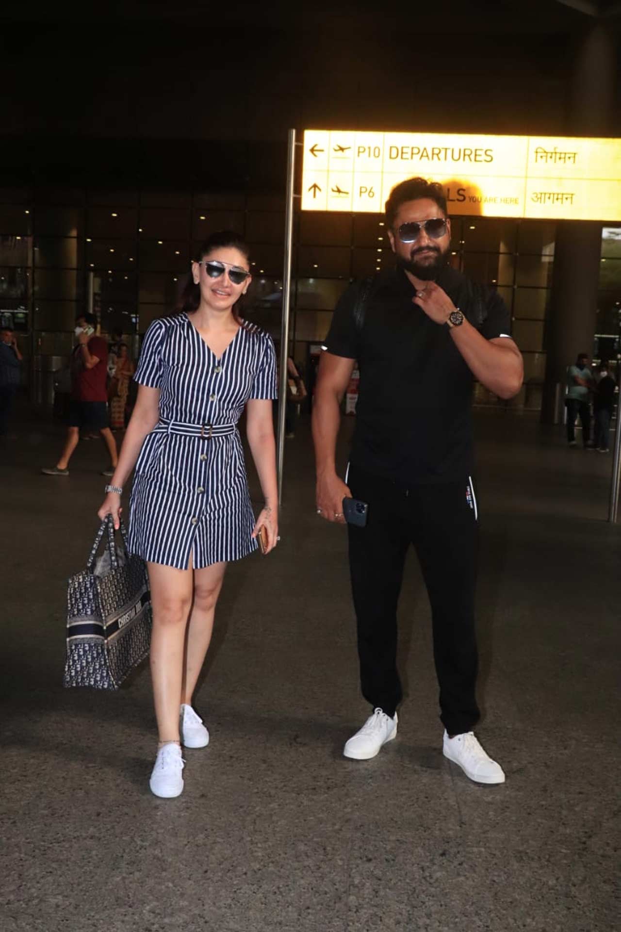 Shefali Jariwala and Parag Tyagi, who were chilling on the pristine sand of Maldives, returned to Mumbai this weekend. The duo posed for the shutterbugs at the Mumbai airport.