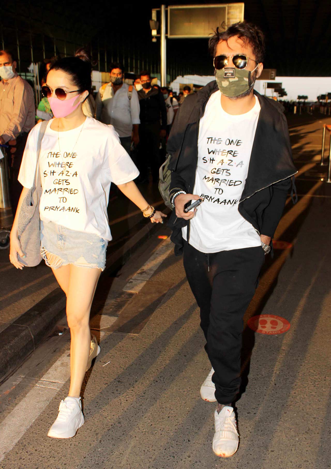 On Sunday, Shraddha Kapoor and brother Siddhanth were spotted at Mumbai airport on their way to the Maldives for cousin Priyaank Sharma’s wedding celebrations. The siblings wore identical T-shirts, which had the names of the bridal couple. It was the dress code of the 'Shaadi' squad. All pictures/Yogen Shah