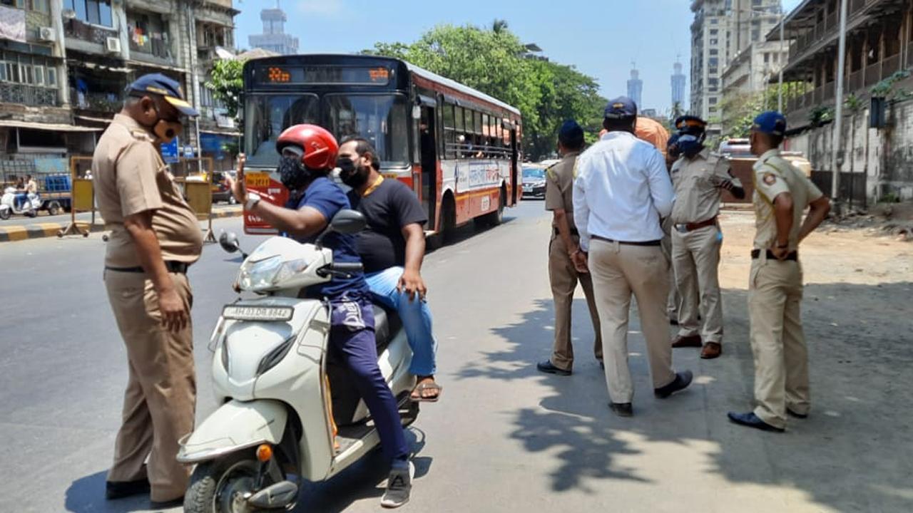 Covid-19: Mumbai Police check IDs of commuters amid lockdown