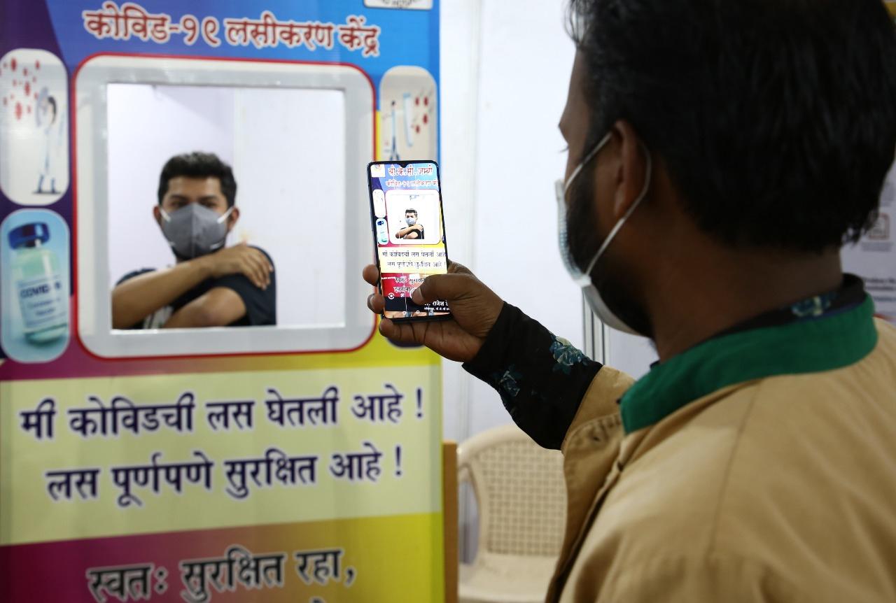 According to the state health department, Maharashtra's recovery rate stands at 84.7 per cent while the case fatality rate is 1.49 per cent.In picture: A man poses for a photograph after taking the COVID-19 jab at the BKC vaccination centre. Photo: Shadab Khan