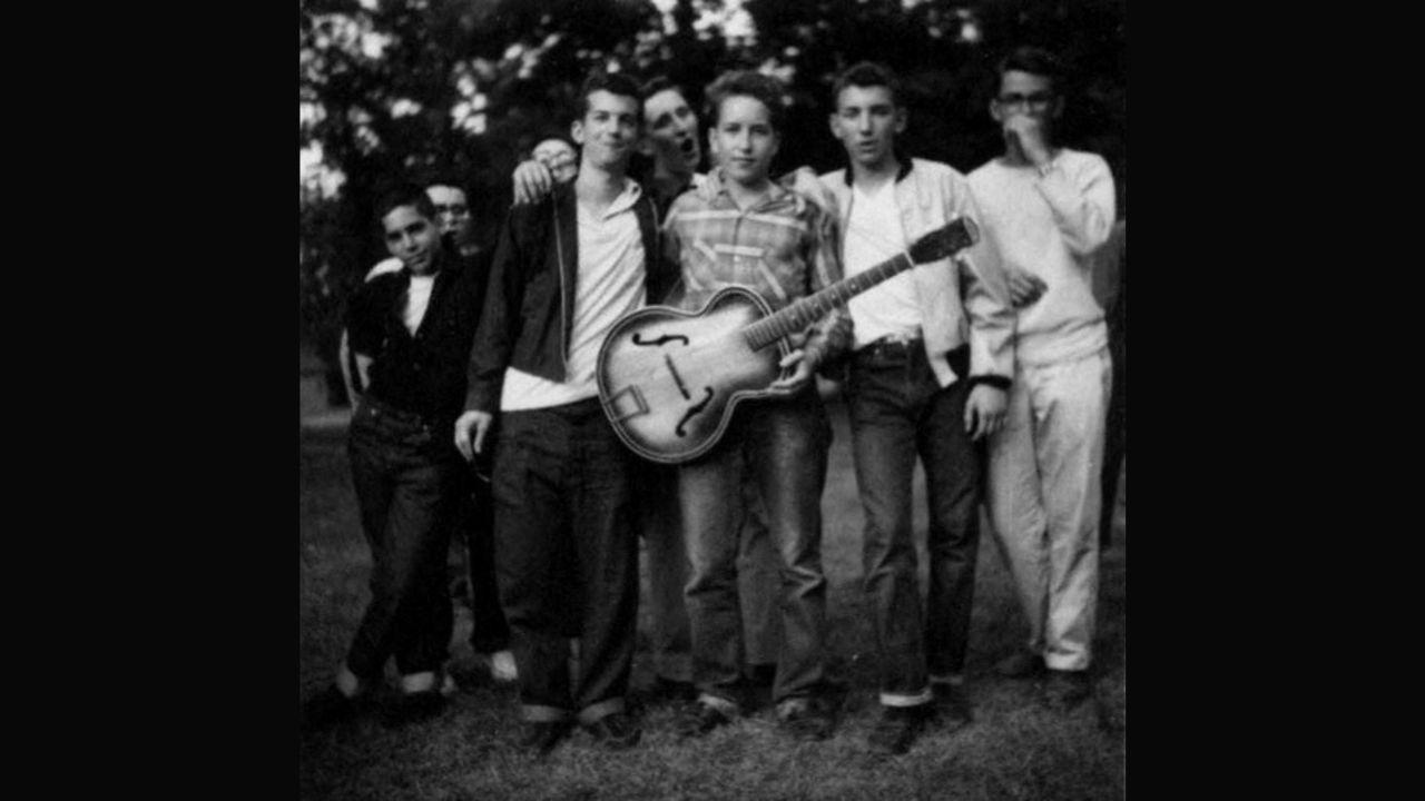 Bob Dylan (centre) looks on during a photo taken in 1957 at Herzl camp, with 