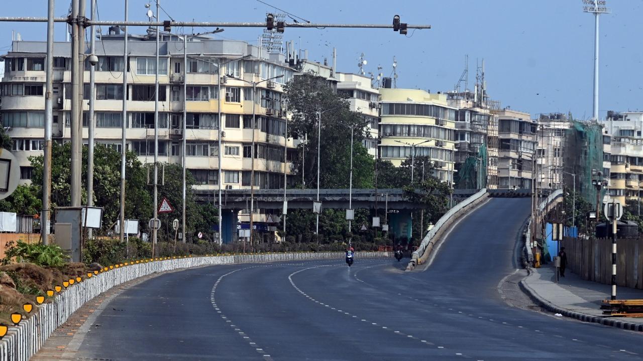 In picture: The iconic Marine Drive in South Mumbai wears a deserted look on Monday as Mumbai reels under the second wave of the COVID-19 pandemic. Photo: Bipin Kokate