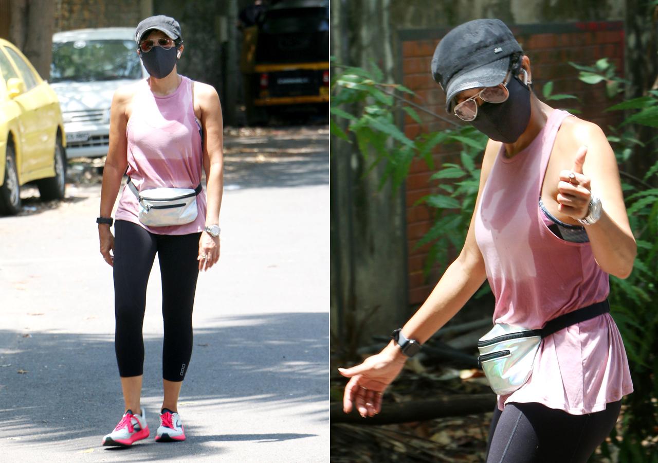 Mandira Bedi was spotted at Pali Hill, Bandra taking a sprint walk. The 49-year-old actress looked fit and fab as she opted for a pink tank top, black jogging pants and sports shoes. Bedi is a fitness freak and does not miss her workout sessions for the world Her frequent posts on Instagram sharing glimpse of her workout sessions is proof enough. (All pictures/Yogen Shah)