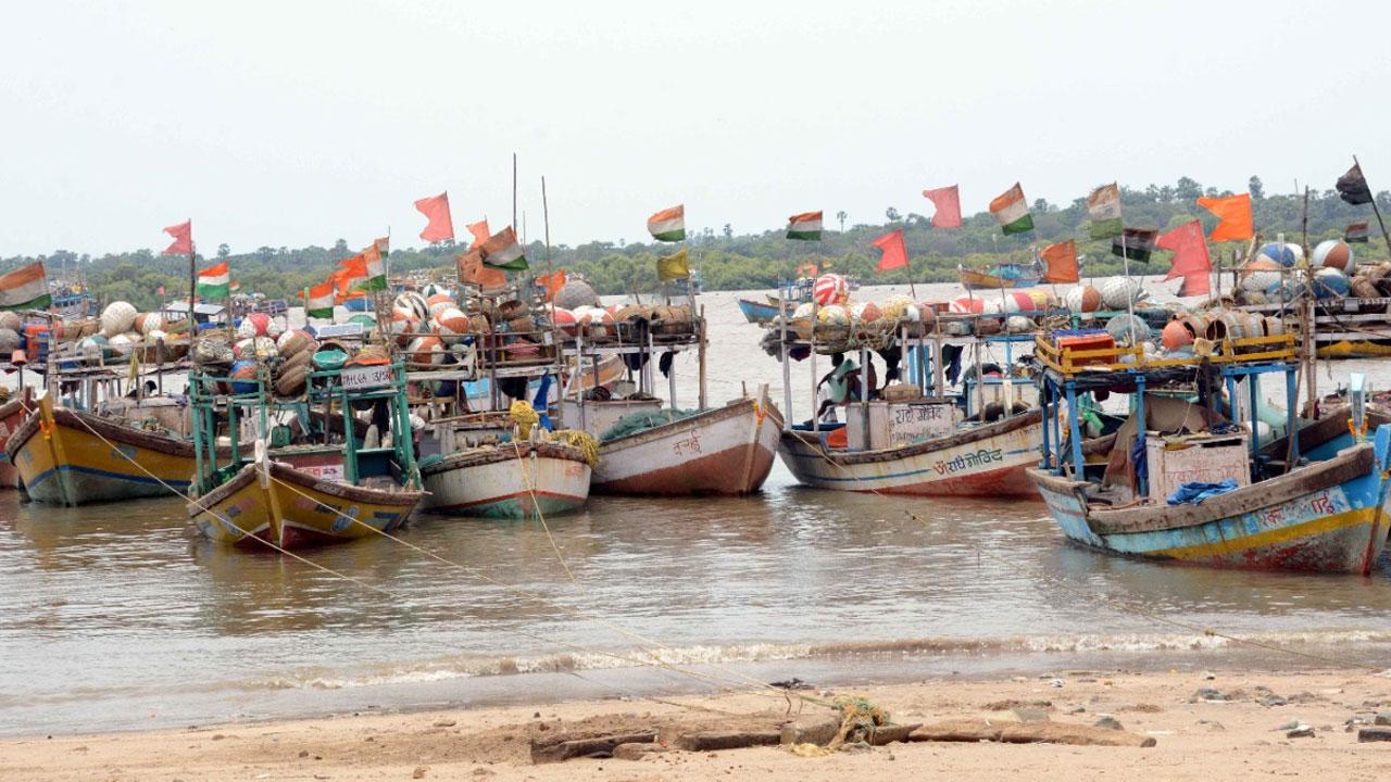 Fishing boats are seen anchored near Manori koliwada in Mumbai on 16 May, 20210 following warning in view of cyclonic storm Tauktae building up in the Arabian sea.  Photo | Satej Shinde