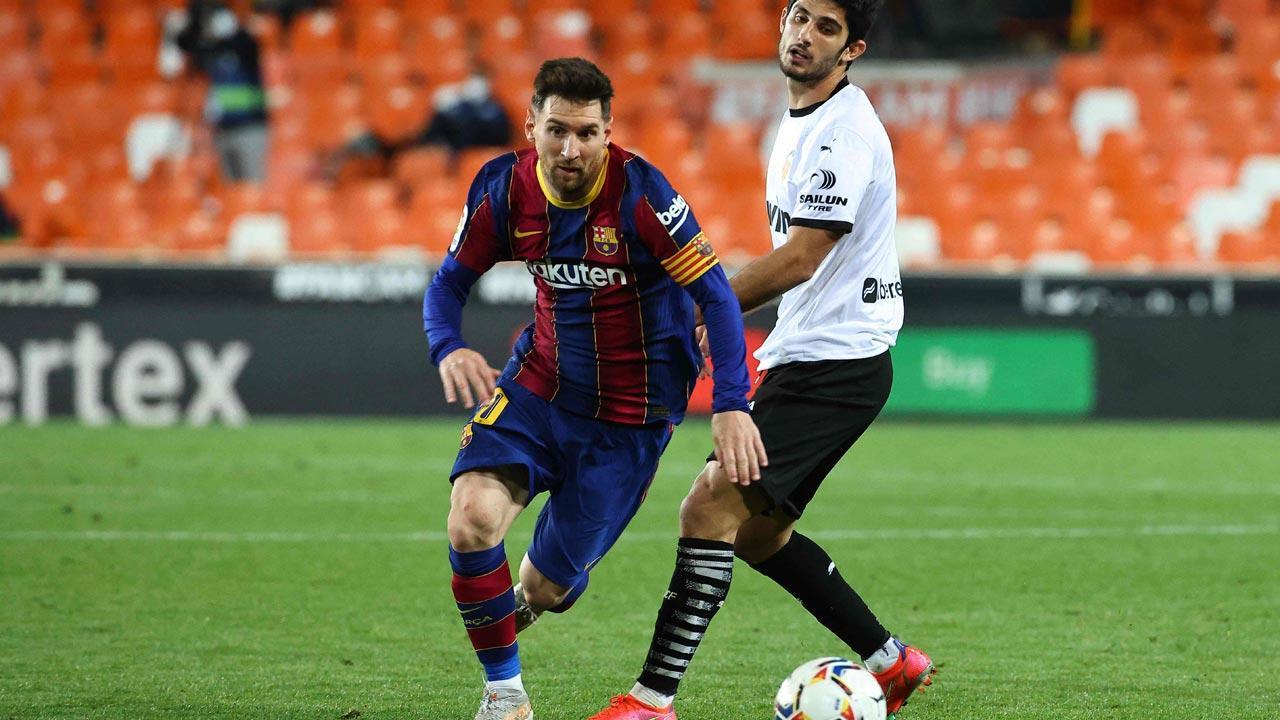 La Liga: Lionel Messi double leads Barcelona to nail-biting win over Valencia