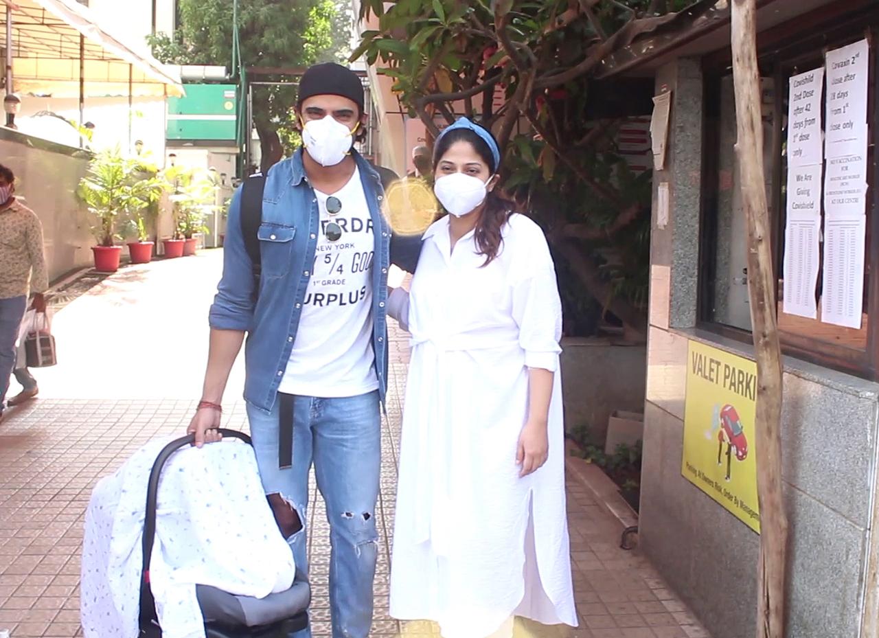 Television actor couple Mohit Malik and Addite Malik were spotted outside Surya Hospital in Mumbai with their newborn baby. The couple welcomed their baby boy on April 29, 2021. (All photos/Yogen Shah)