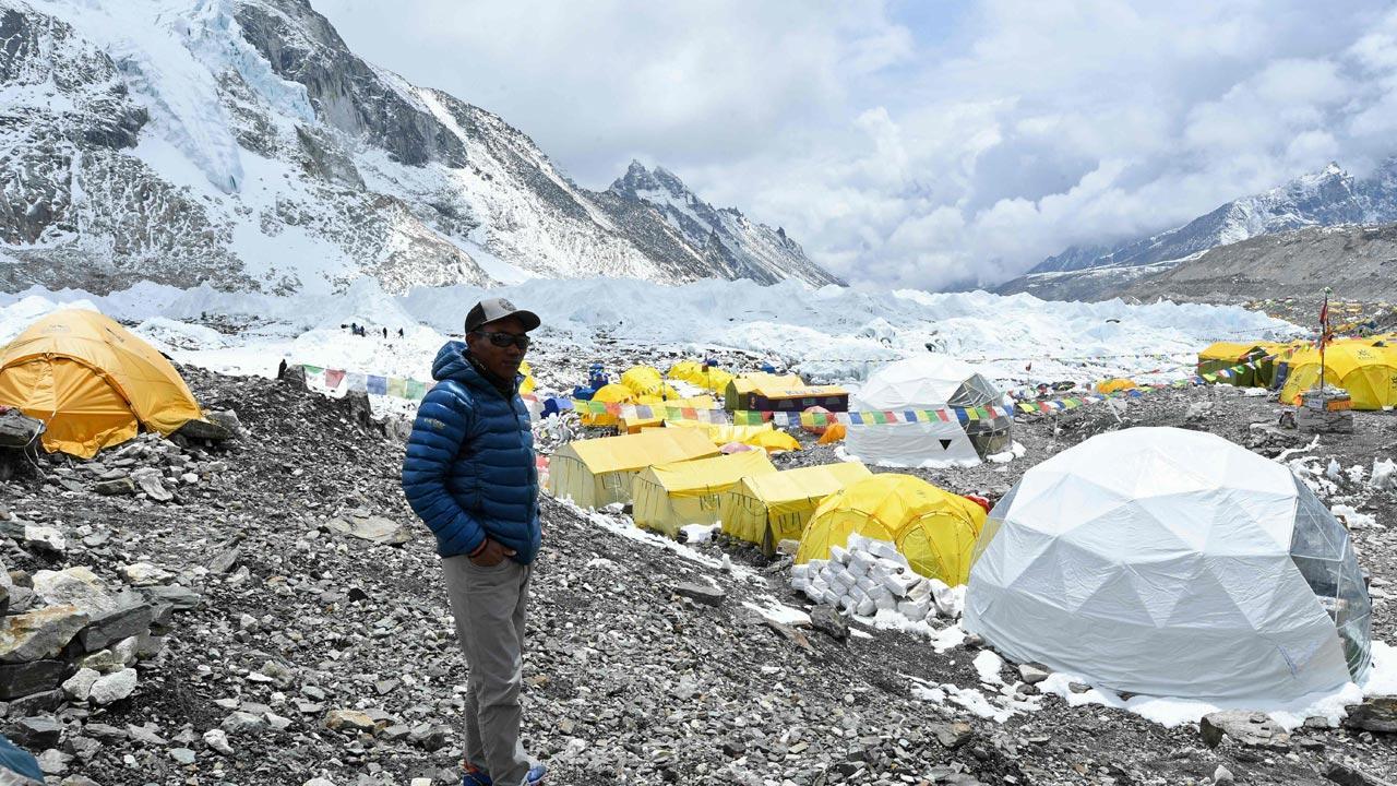Nepali guide breaks own record by climbing Everest 25 times