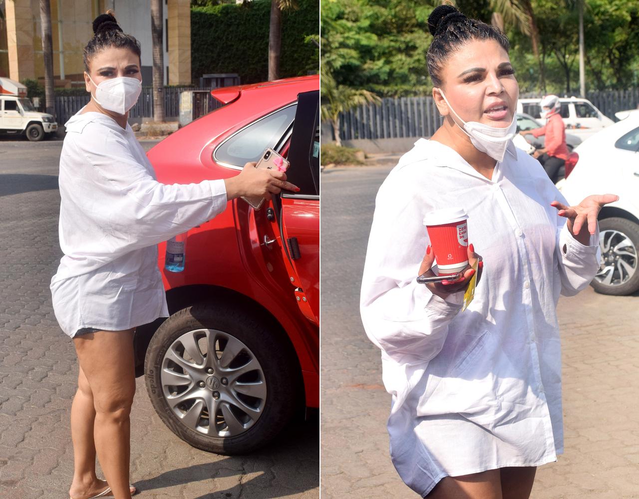 Rakhi Sawant was clicked outside a coffee shop in Lokhandwala, Andheri. The actress opted for a white oversized shirt and blue denim shorts.