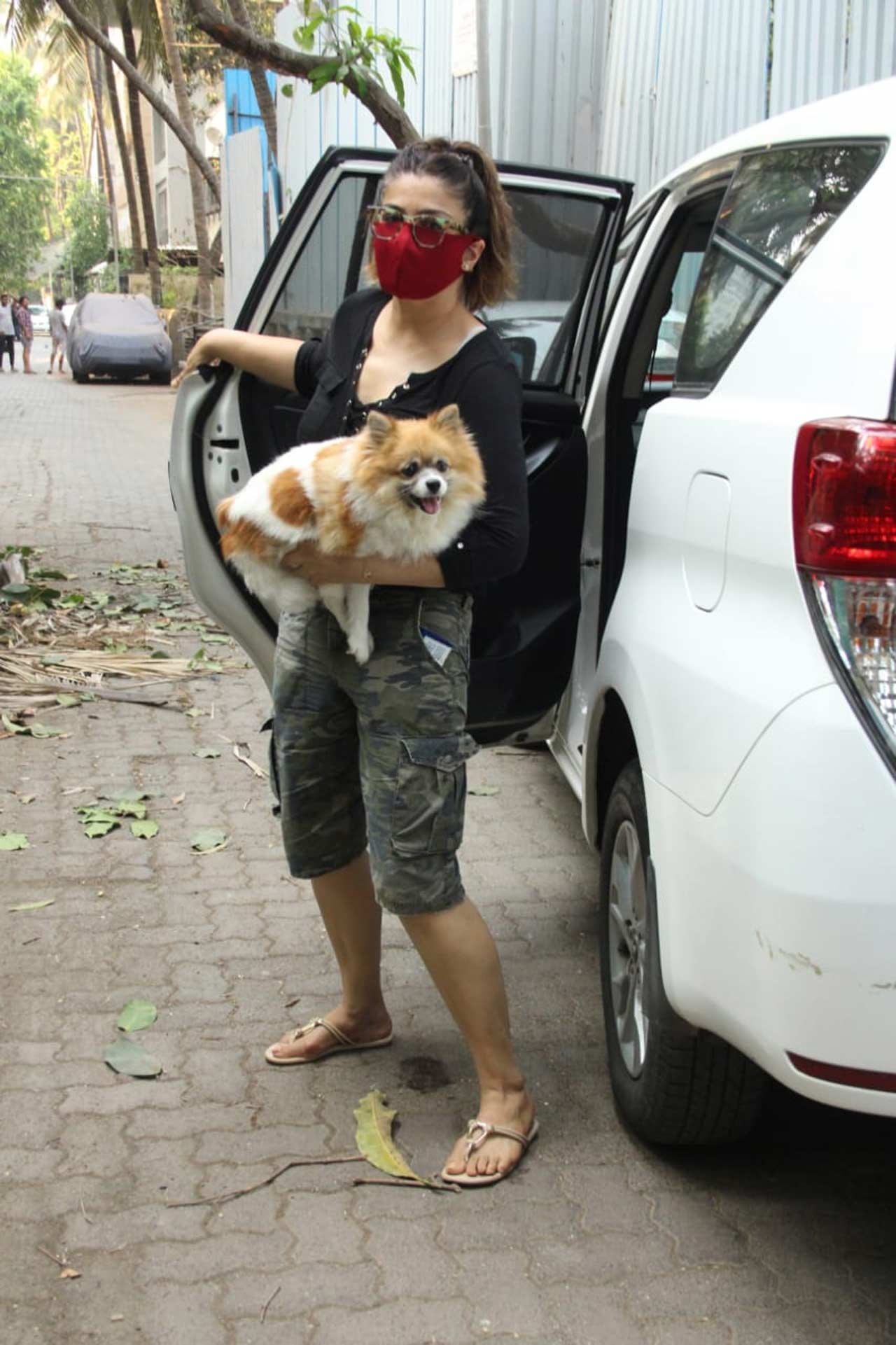 Raveena Tandon Thadani was spotted with her pet dog at a veterinary clinic in Bandra. The animal lover appeared to be anxious about the pooch’s well-being.