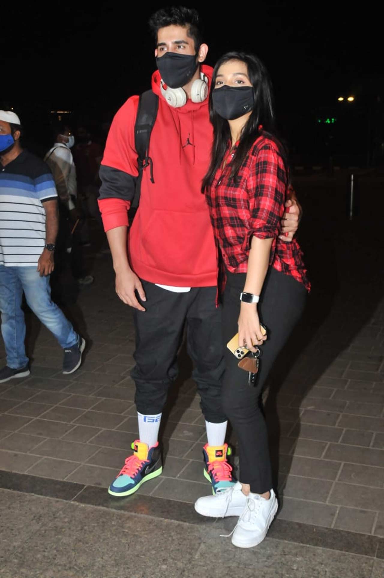 Varun Sood and Divya Agarwal also posed for the shutterbugs when snapped twinning in a red and black outfit at the Mumbai airport. 