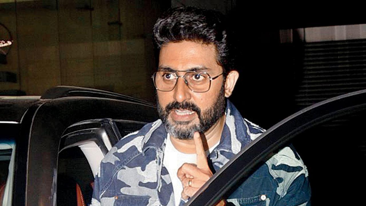 Up and About: Abhishek Bachchan graces photographers with just one last click