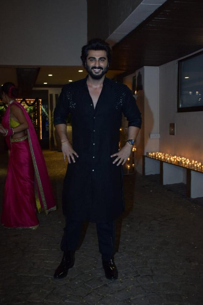Arjun Kapoor looked stylish in his all-black ethnic outfit and a full beard.