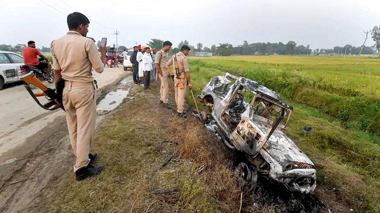 Police visit Lakhimpur Kheri district’s Tikunia village. File Pics/PTI