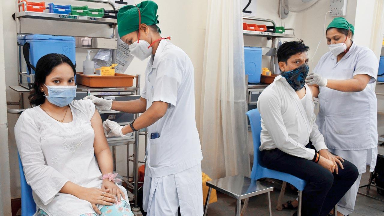 A woman is vaccinated at Nair Hospital on Saturday. Pic/Ashish Raje