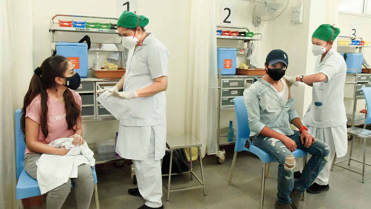 Vaccination in progress at the OPD of Nair hospital on Tuesday. Pic/Suresh Karkera