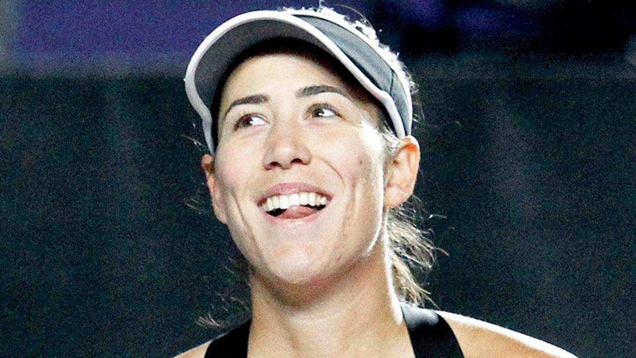 Muguruza edges out Kontaveit to set up all-Spanish semis
