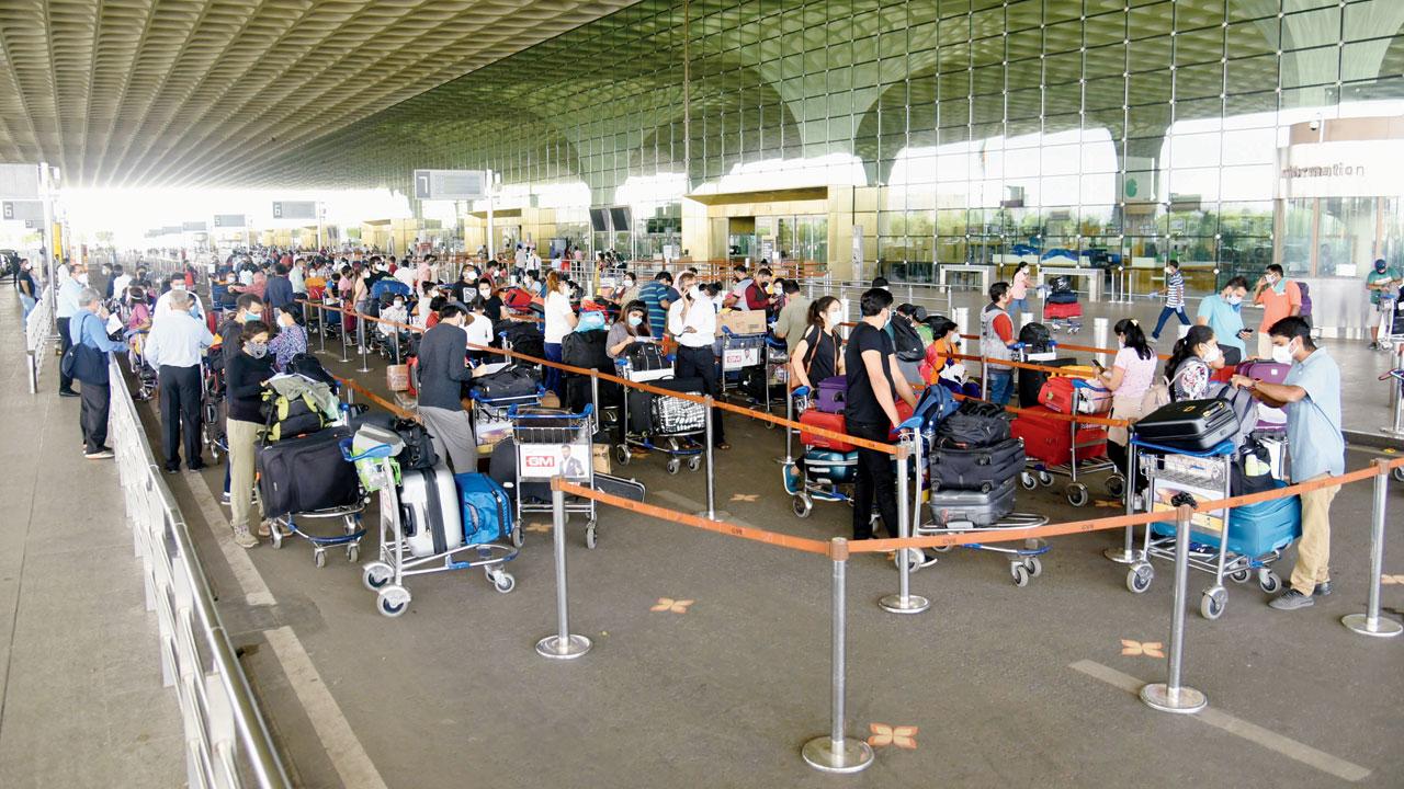 People in queue at the Mumbai  International Airport