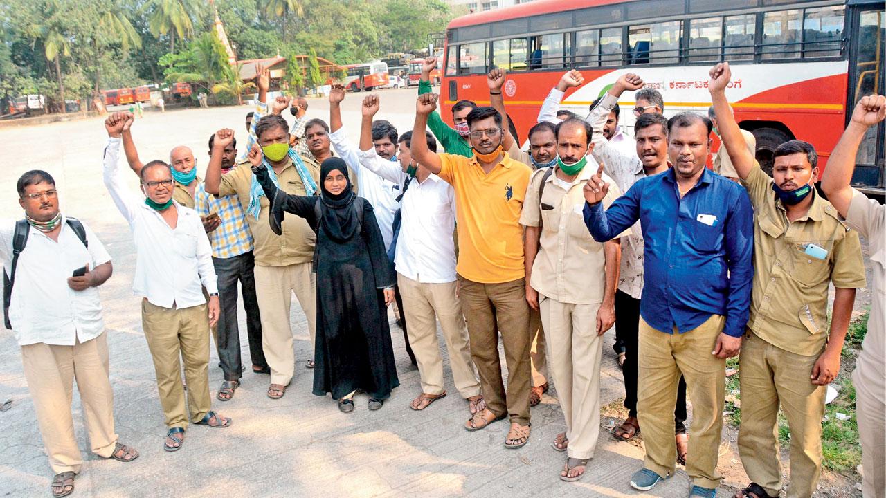 Protesting MSRTC employees at Kurla ST depot on Monday. Pic/Sayyed Sameer Abedi